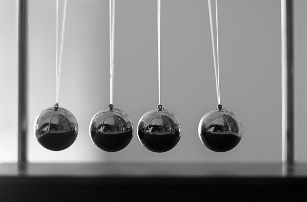 Quatre pendules en rang